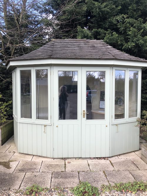 white summer house for sale